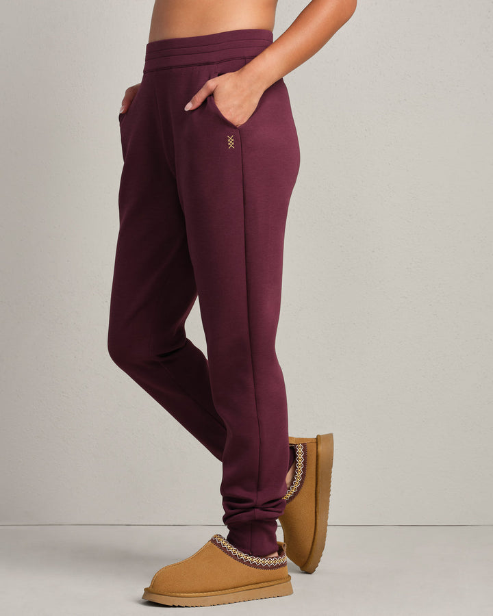 Rhone DreamGlow Taper Leg Pant- Bordeaux Red