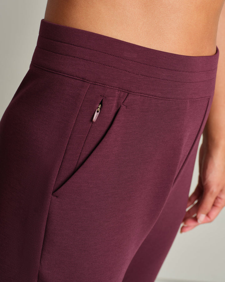 Rhone DreamGlow Taper Leg Pant- Bordeaux Red